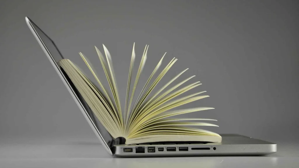 Download free HD stock image of Laptop Book